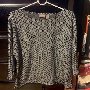 Chico’s black and white patterned top.  Never worn, tags still on.  Size 2.